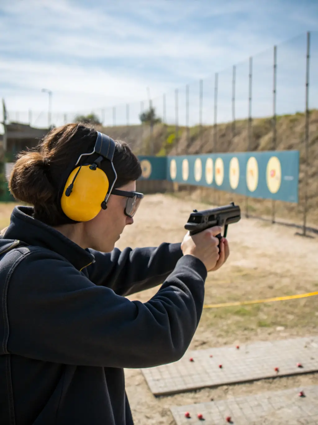 An image of participants in a hunter safety course, demonstrating the proper handling of firearms and adherence to safety regulations.